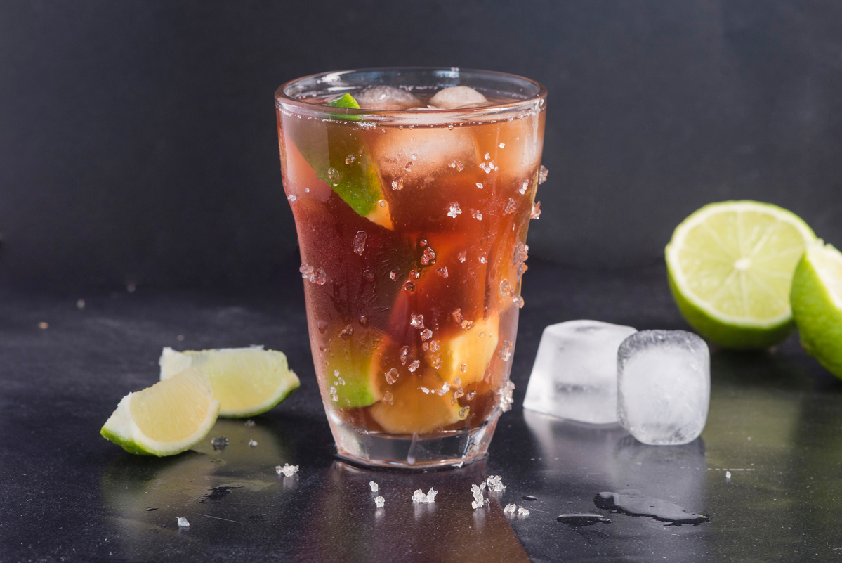 cola cocktail on dark background